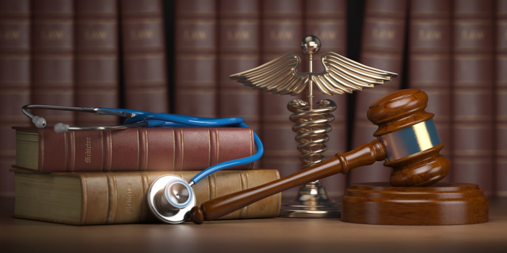 Some Books, A Stethoscope And A Judges Hammer