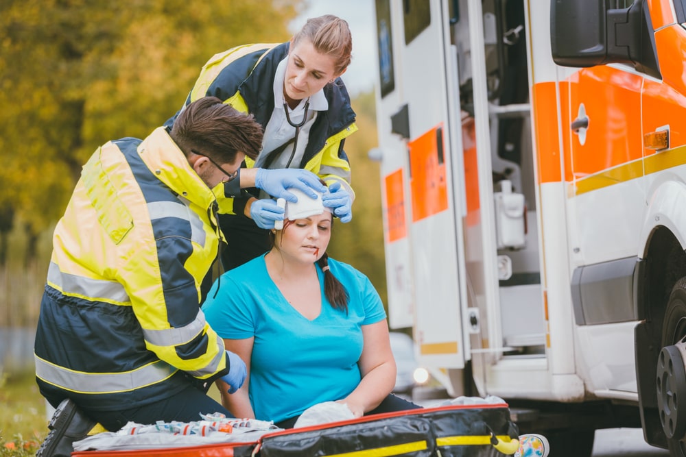 Paramedics Taking Care Of An Injured Person