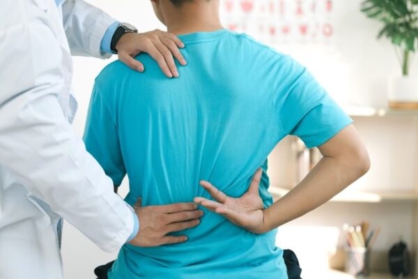 A photo of a patient indicating where there is pain on his or her back